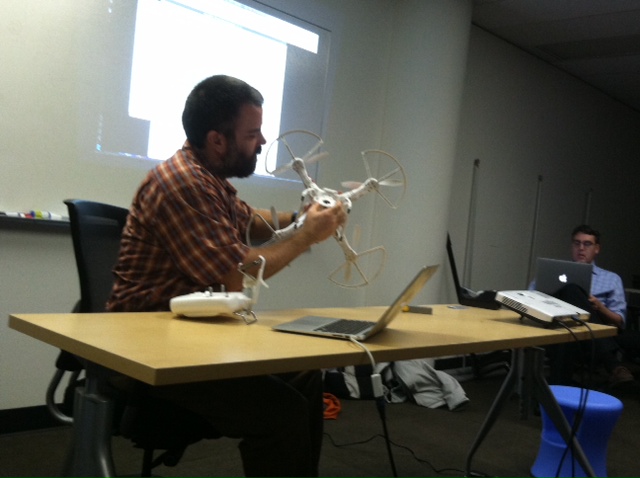 Aaron showing us his quadcopter, so to speak